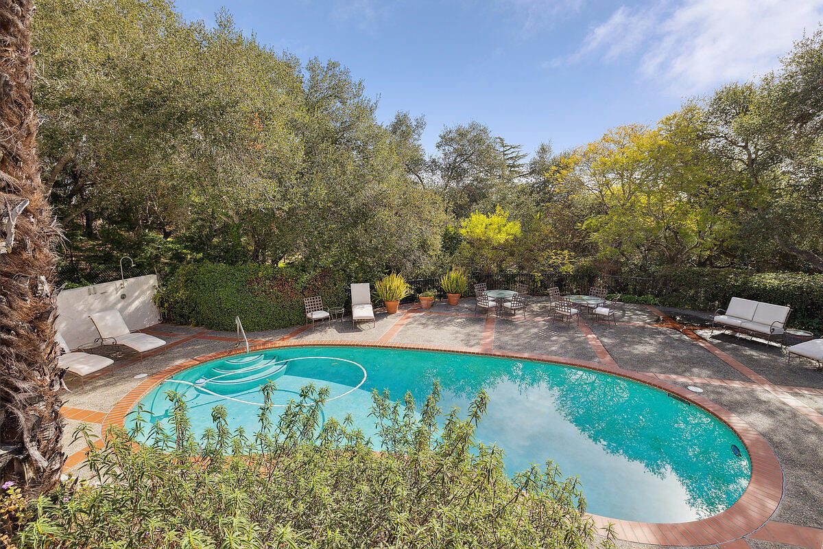 Kitchen and breakfast area in warm natural light.
